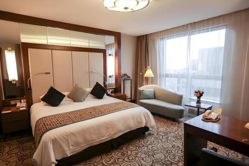 Grand Soluxe Zhongyou Hotel Шанхай Екстериор снимка