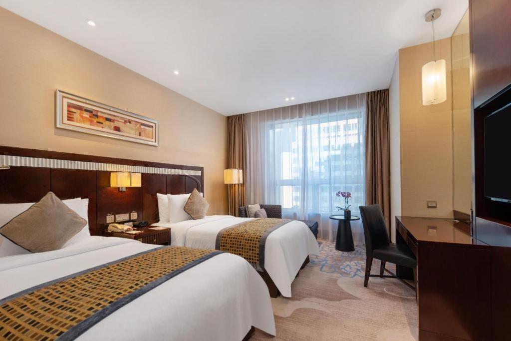 Grand Soluxe Zhongyou Hotel Шанхай Екстериор снимка
