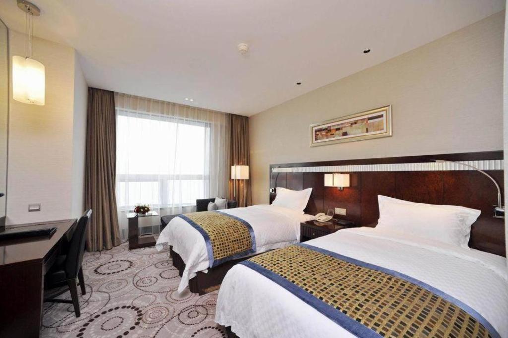 Grand Soluxe Zhongyou Hotel Шанхай Екстериор снимка
